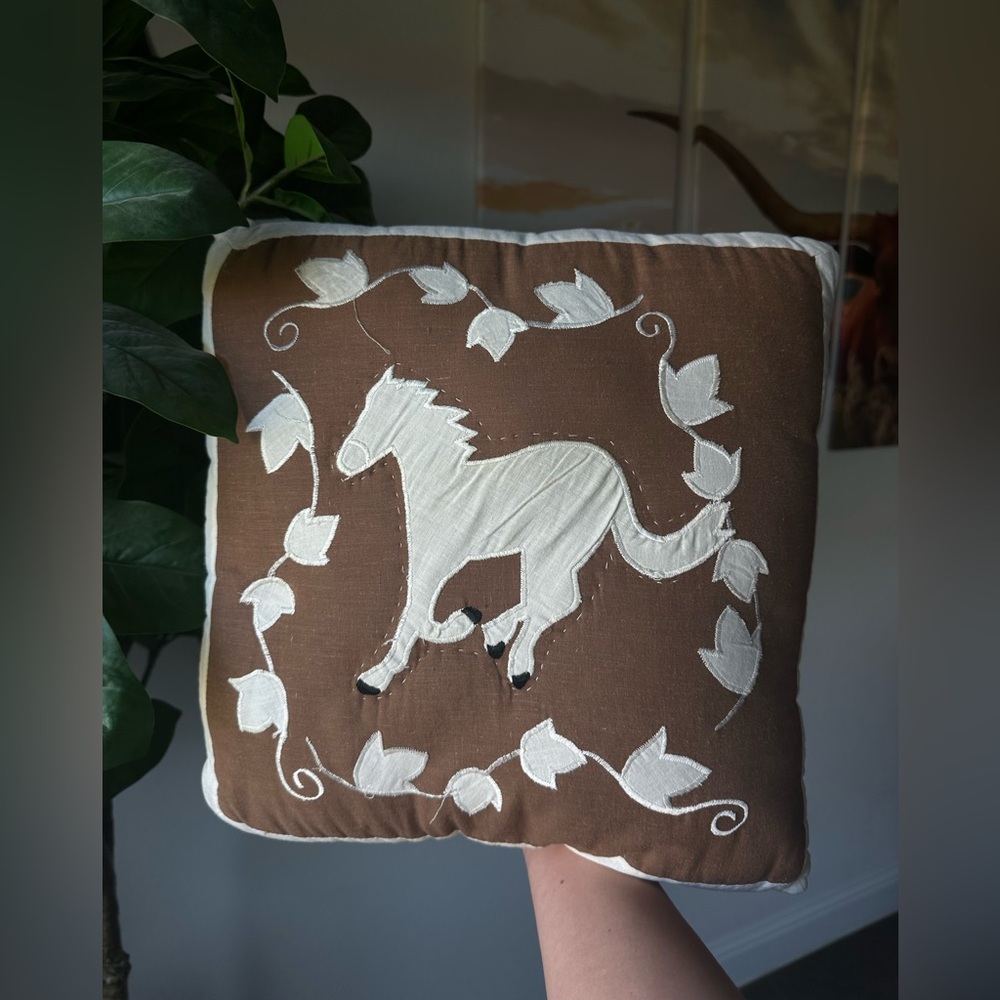 Brown Pillow with White Horse Design